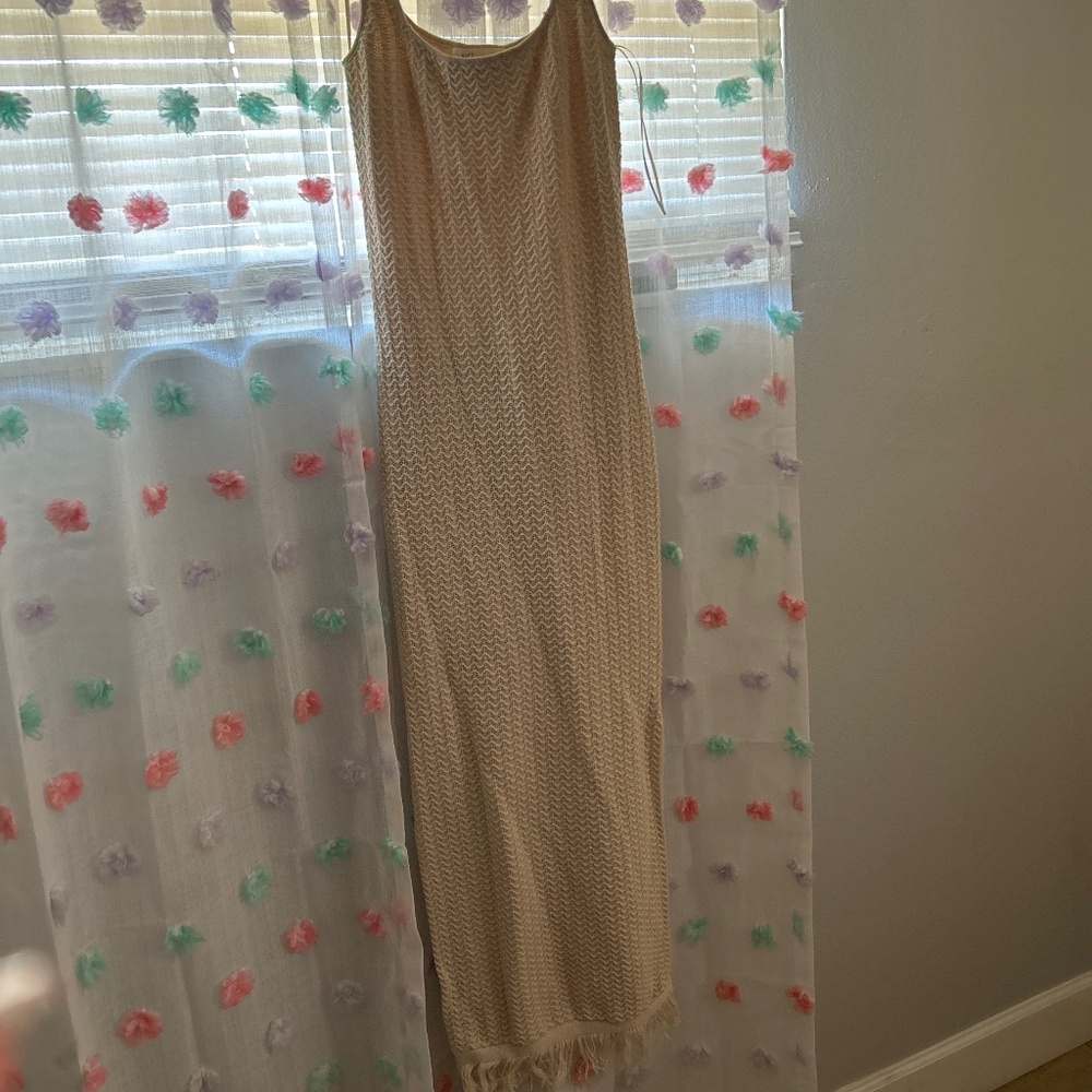 Tan midi dress with fringe at bottom